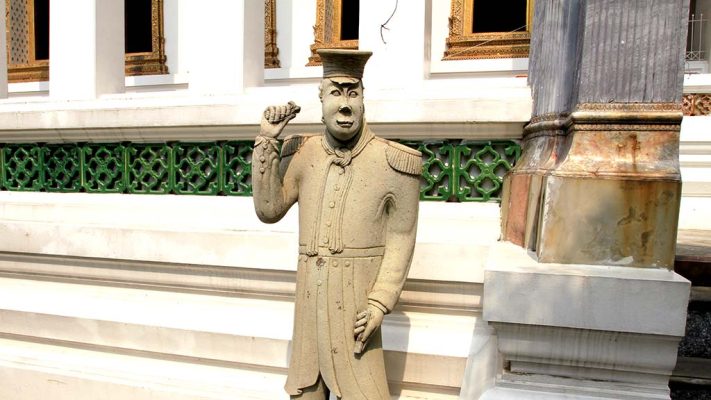 Statue of a soldier in the courtyard of Wat Suthat Thepwararam.