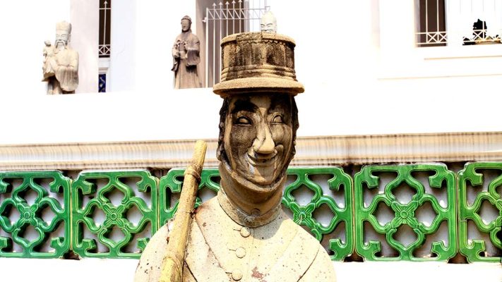 Close-up of the statue of a soldier in the courtyard of Wat Suthat Thepwararam.